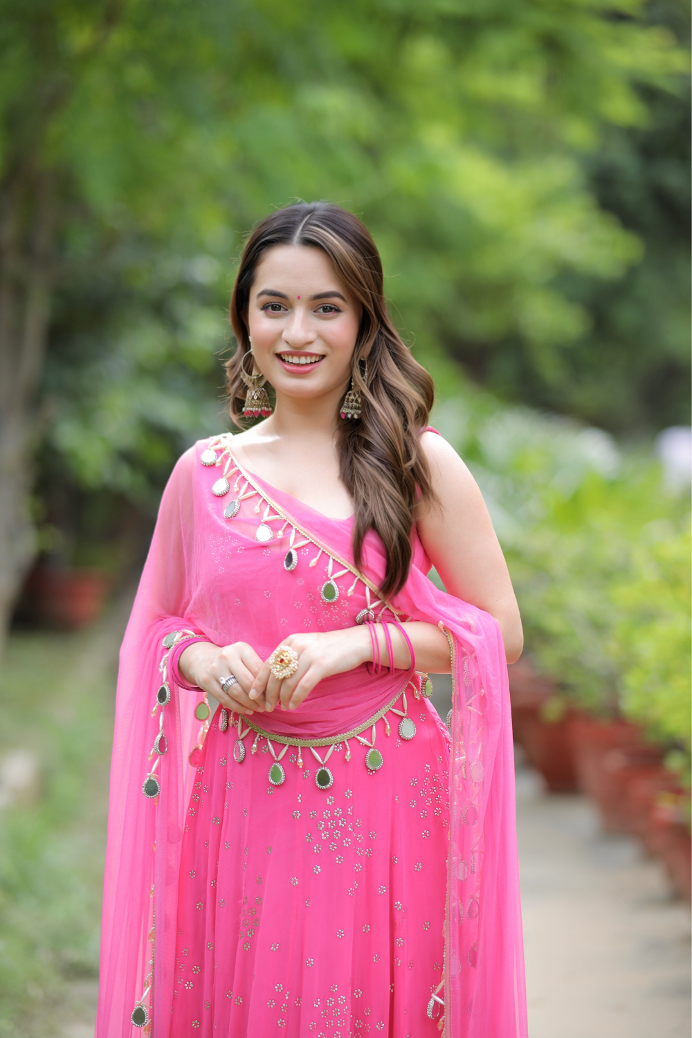 Pink Dolly Anarkali dress by Imagine By Shiwali, featuring intricate embroidery and flowing fabric, displayed on a mannequin.