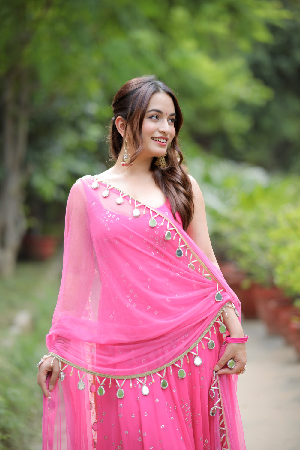 Pink Dolly Anarkali dress by Imagine By Shiwali featuring intricate embroidery and flowing fabric.