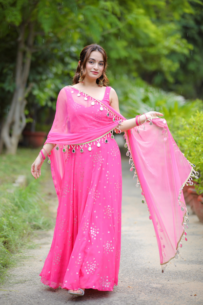 Imagine by Shiwali Dolly Pink Anarkali dress with intricate embroidery and flowing fabric, styled with a fitted bodice and flared skirt.