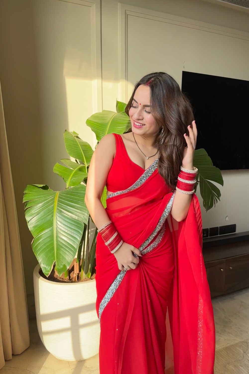 About Raveena Georgette Saree with Blouse