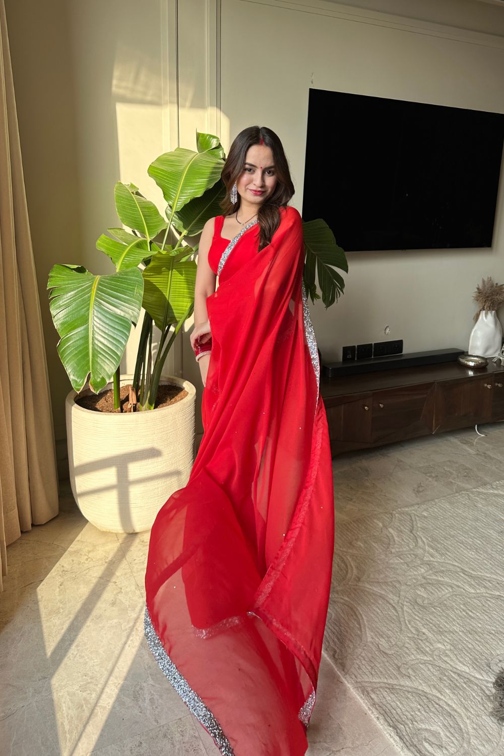Raveena Georgette Saree with matching blouse from Imagine By Shiwali, featuring elegant drape and intricate design details.