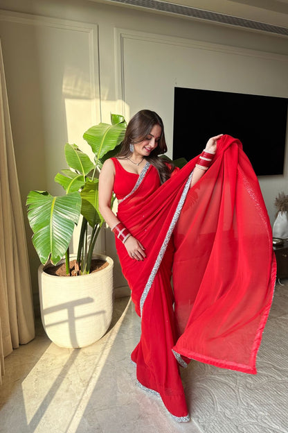Raveena Georgette Saree with matching blouse by Imagine By Shiwali, featuring elegant drape and intricate fabric details.