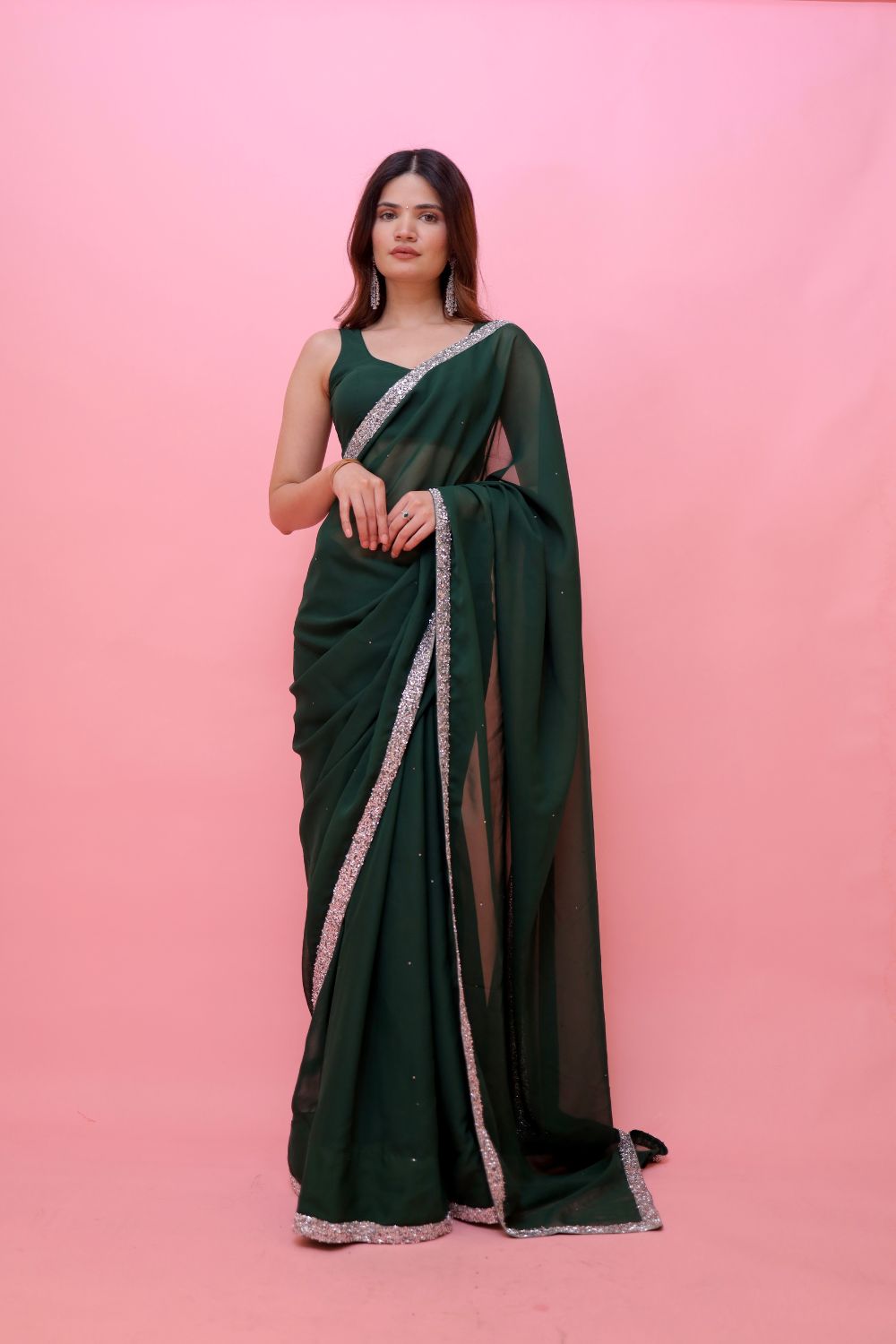 Raveena Georgette saree with matching blouse by Imagine By Shiwali, featuring elegant drape and intricate design.