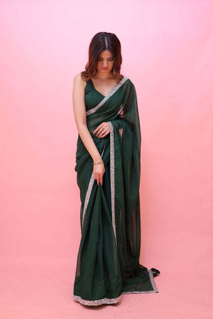 Raveena Georgette Saree with matching blouse by Imagine By Shiwali, showcasing intricate draping and elegant fabric details.