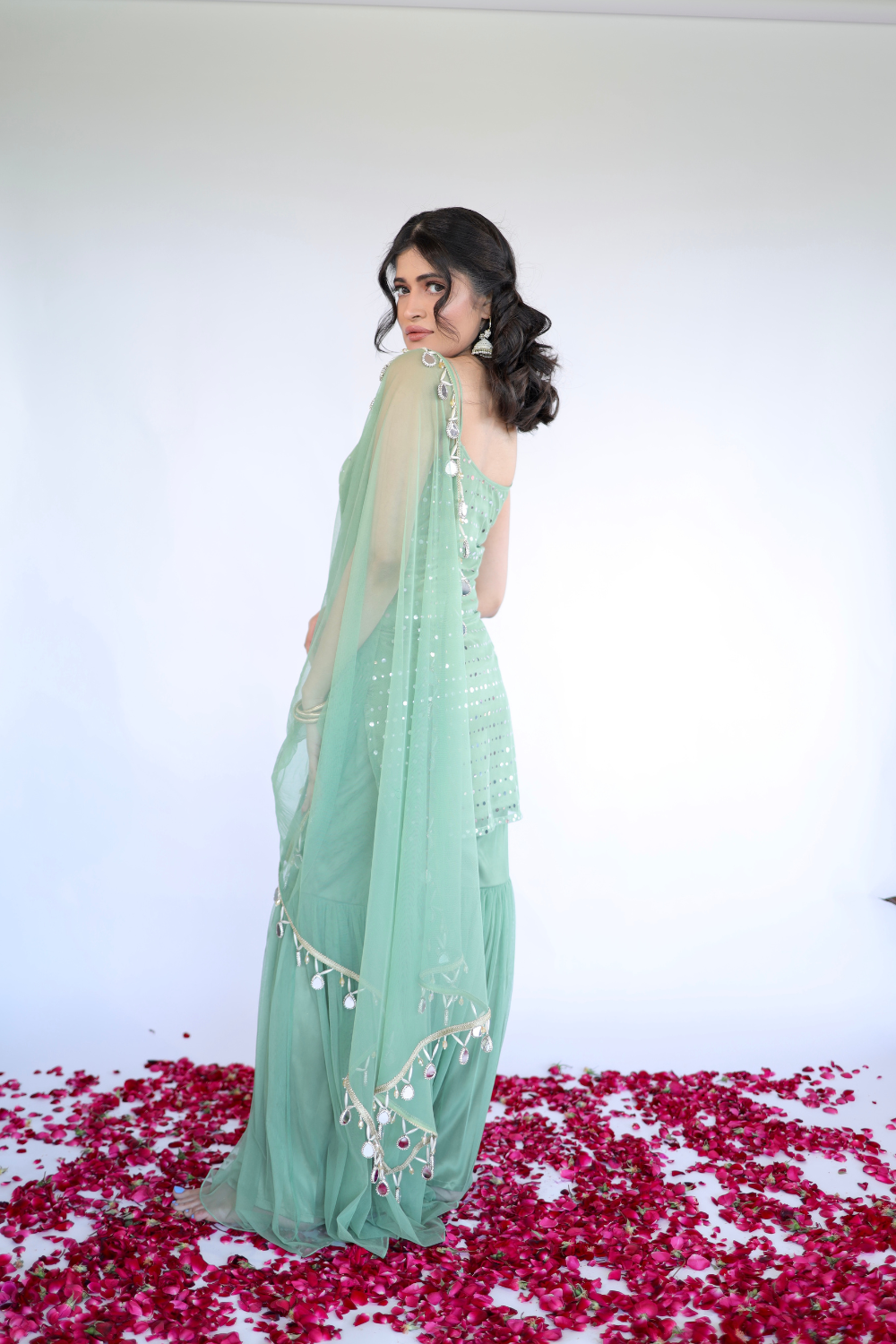 Imagine By Shiwali Keeva Green Sharara Set featuring a kurta with intricate embroidery and matching green sharara pants.
