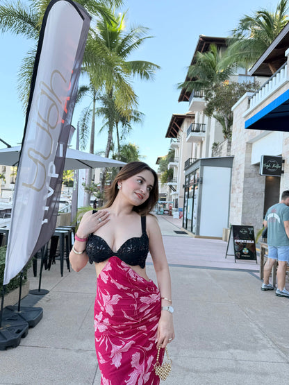 Imagine By Shiwali Koko Black-Pink cocktail gown, sleeveless with elegant draping and a fitted silhouette, showcased on a mannequin.