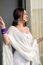 White Laila Chikankari Sharara Suit by Imagine By Shiwali, featuring intricate embroidery and traditional design.