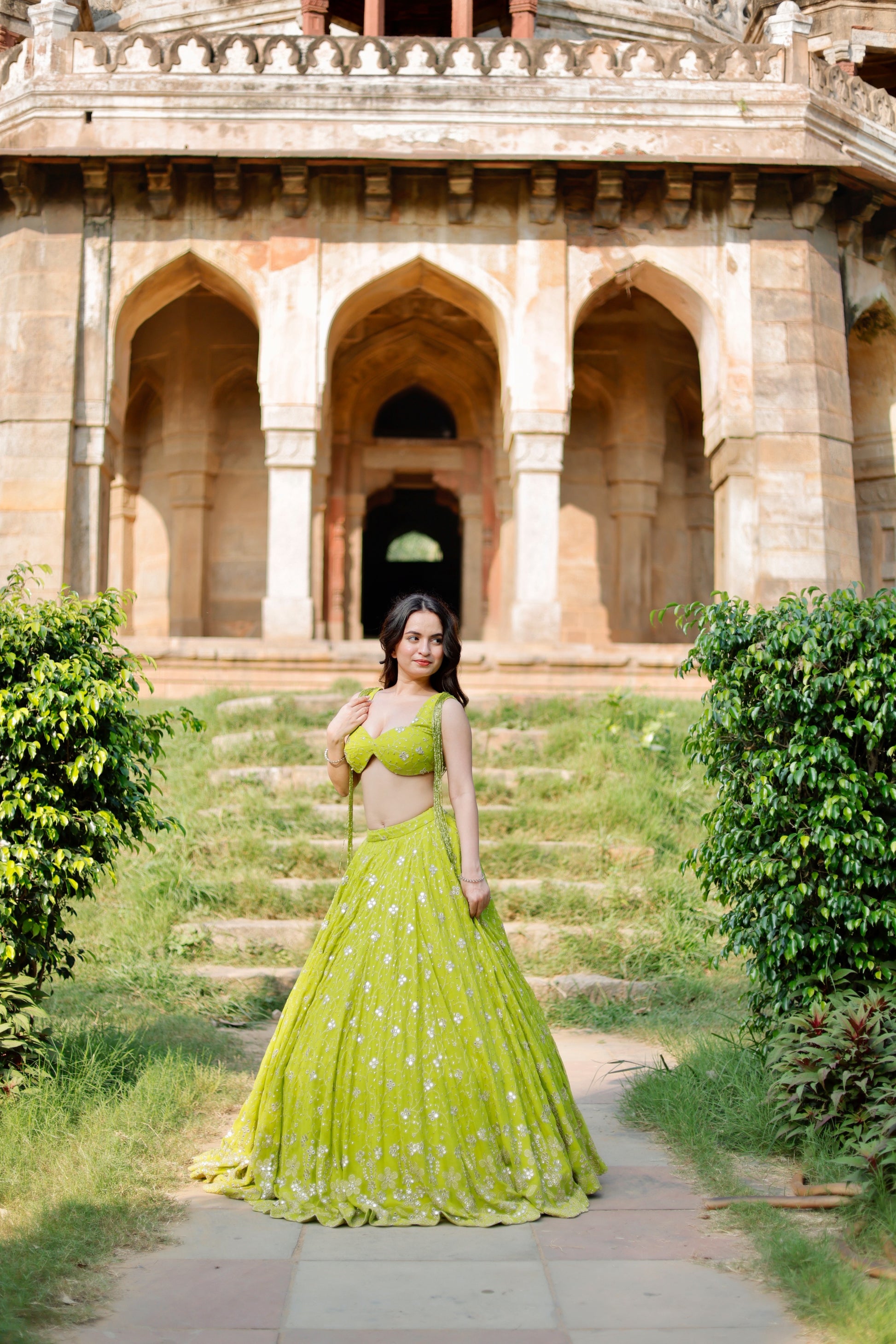 Lehra Lime Blossom Mirror Lehenga Set by Imagine By Shiwali featuring intricate mirror work and vibrant lime green fabric.