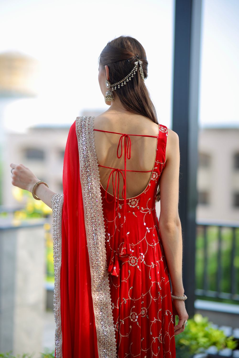 Red Maastani Anarkali dress by Imagine By Shiwali featuring intricate embroidery and traditional design.