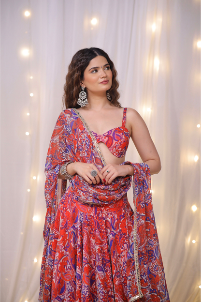 Multicolor paisley printed lehenga set by Imagine By Shiwali featuring intricate patterns and vibrant colors, perfect for festive occasions.