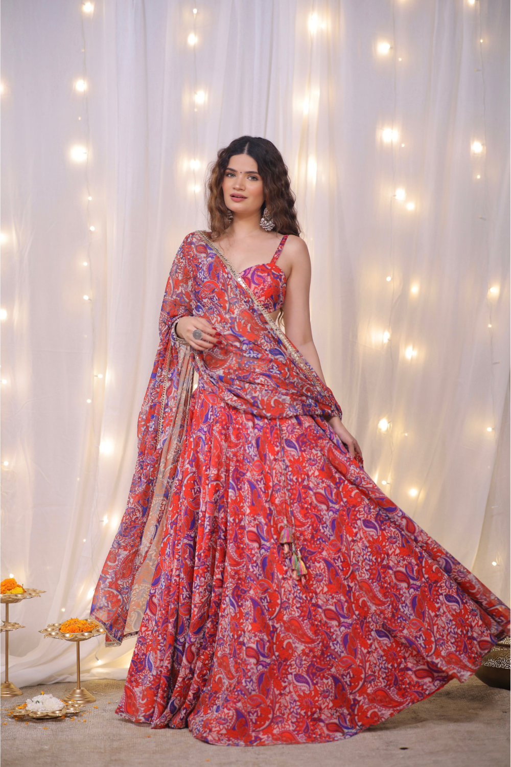 Multicolor paisley printed lehenga set by Imagine By Shiwali, featuring intricate embroidery and traditional design.