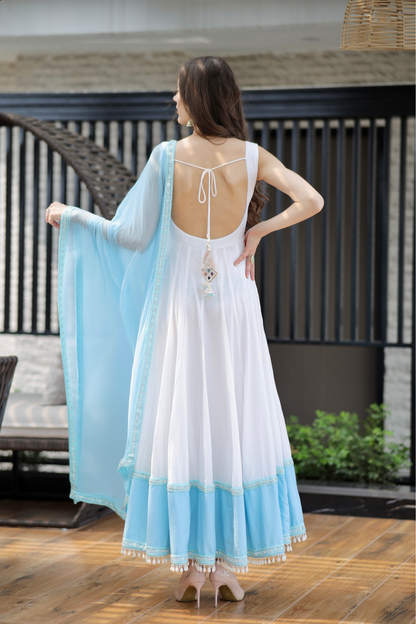 White and blue Meera Anarkali dress by Imagine By Shiwali with intricate embroidery and flowing fabric.