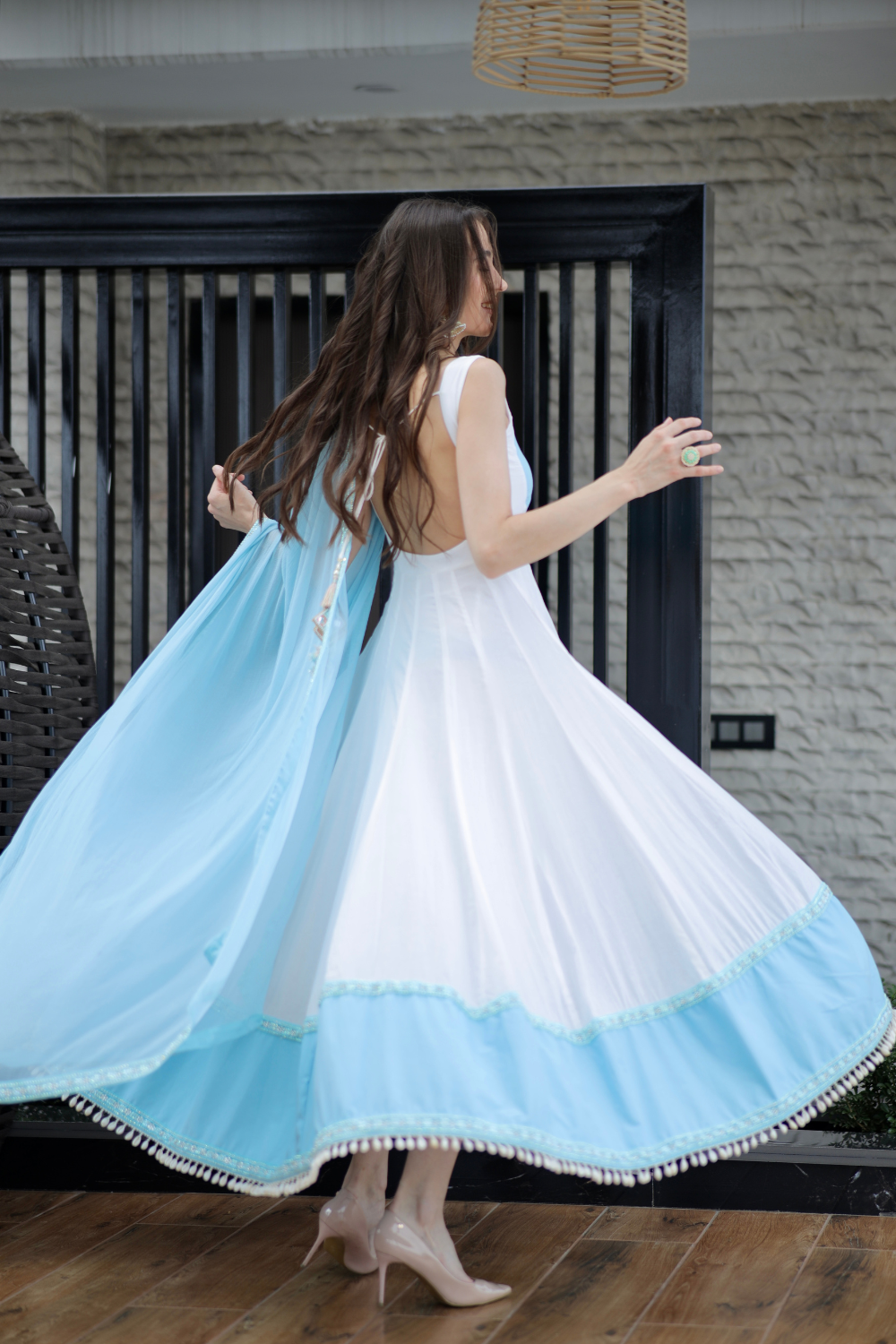 White and blue Meera Anarkali dress by Imagine By Shiwali featuring intricate embroidery and a flowing silhouette.