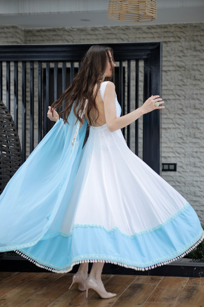 White and blue Meera Anarkali dress by Imagine By Shiwali featuring intricate embroidery and a flowing silhouette.