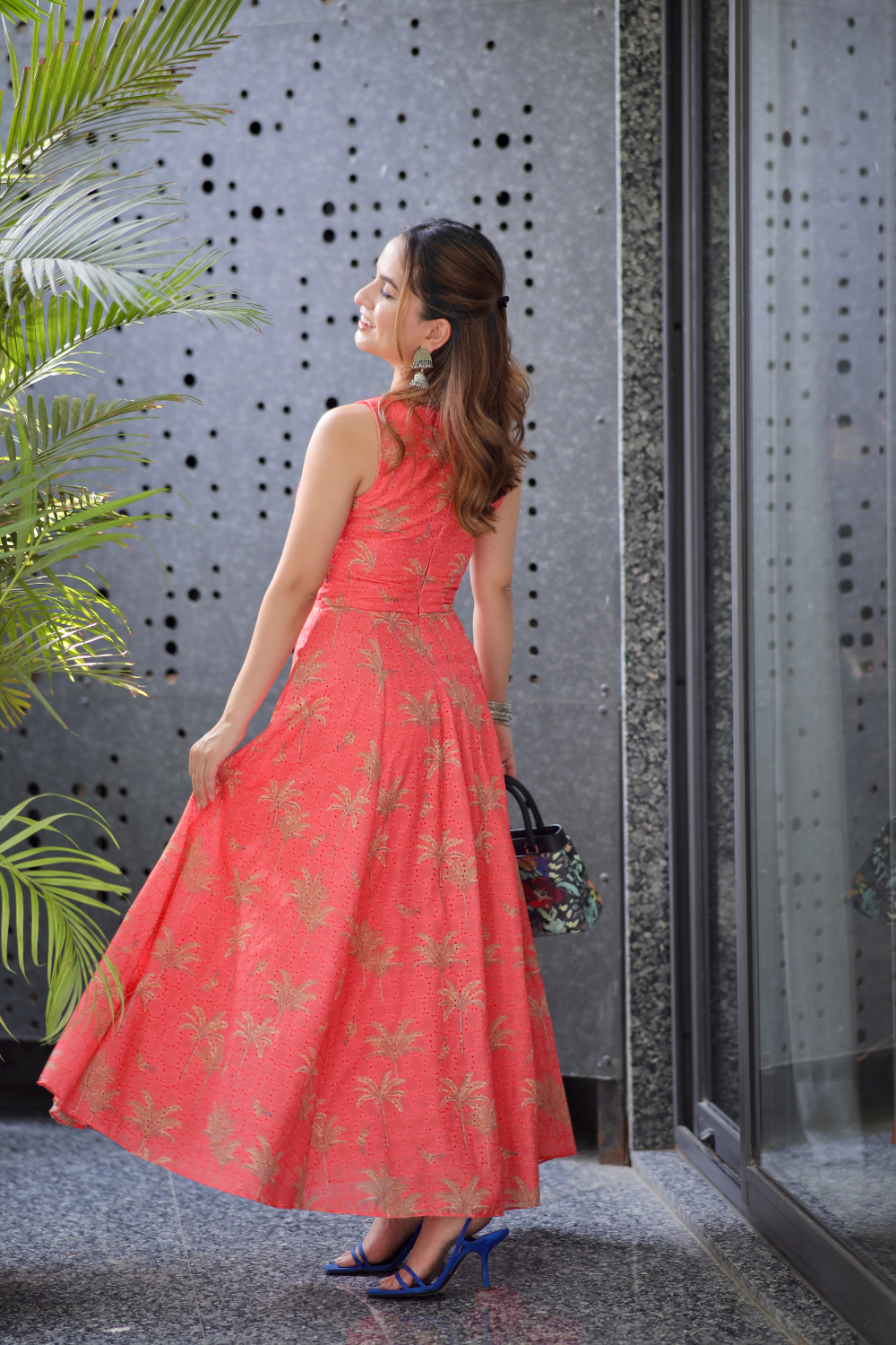 Imagine by Shiwali Mili Orange Dress for women, featuring a flowy design and vibrant color, shown on a model.