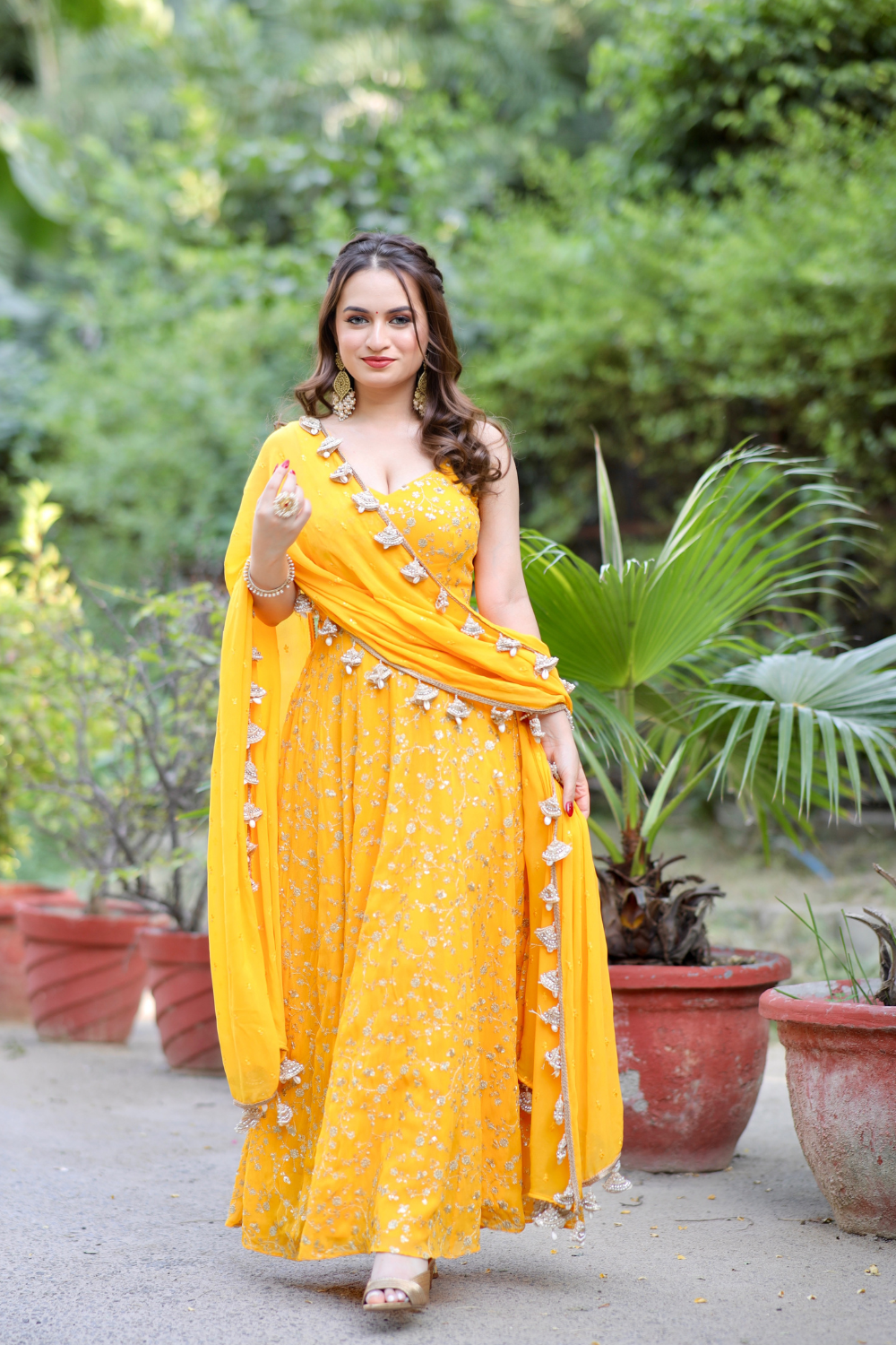 About Noor Yellow Anarkali with Zari Work