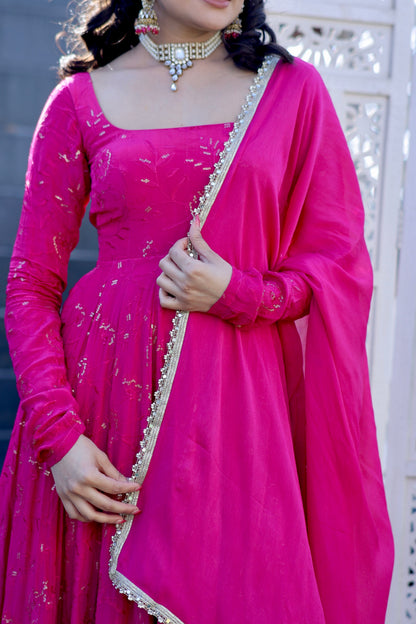 Hot pink Nurvi Anarkali suit with plazo pants by Imagine By Shiwali, featuring intricate embroidery and traditional design.