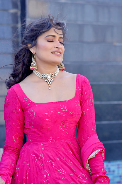 Hot pink Nurvi Anarkali dress with matching plazo pants from Imagine By Shiwali, featuring intricate embroidery and traditional style.