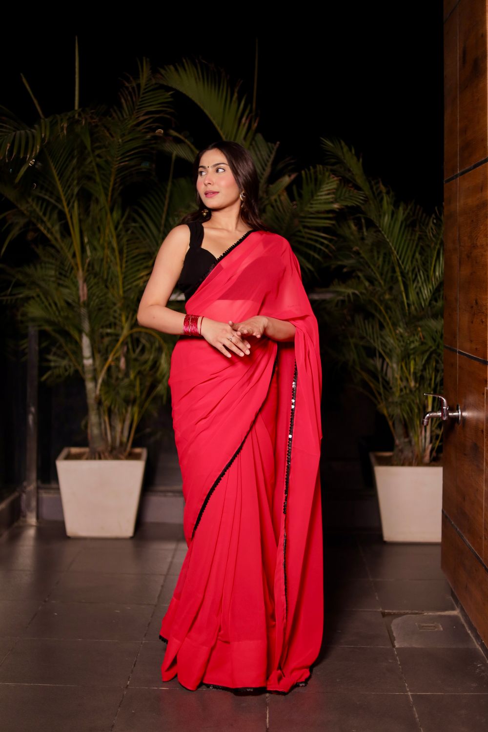 About Raveena Georgette Saree with Blouse