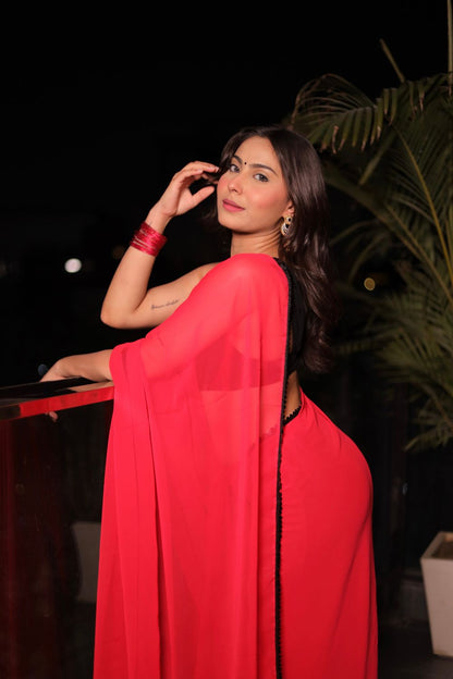 Raveena Georgette Saree with Blouse by Imagine By Shiwali, showcasing vibrant fabric and intricate design in a traditional style.