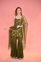 Rekha Green Sharara Suit by Imagine By Shiwali, featuring intricate embroidery and flowing fabric, displayed on a mannequin.