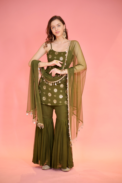 Green Rekha Sharara Suit by Imagine By Shiwali, featuring intricate embroidery and flowing sharara pants.