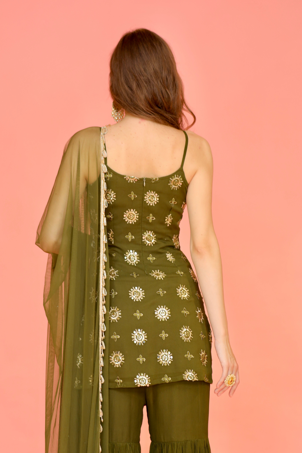 Green Rekha Sharara Suit by Imagine By Shiwali featuring intricate embroidery and flowing fabric, styled for traditional elegance.