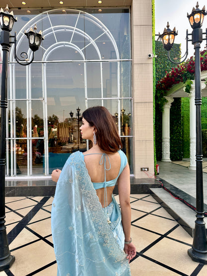 Blue Reva saree by Imagine By Shiwali, showcasing intricate designs and traditional drape in vibrant fabric.