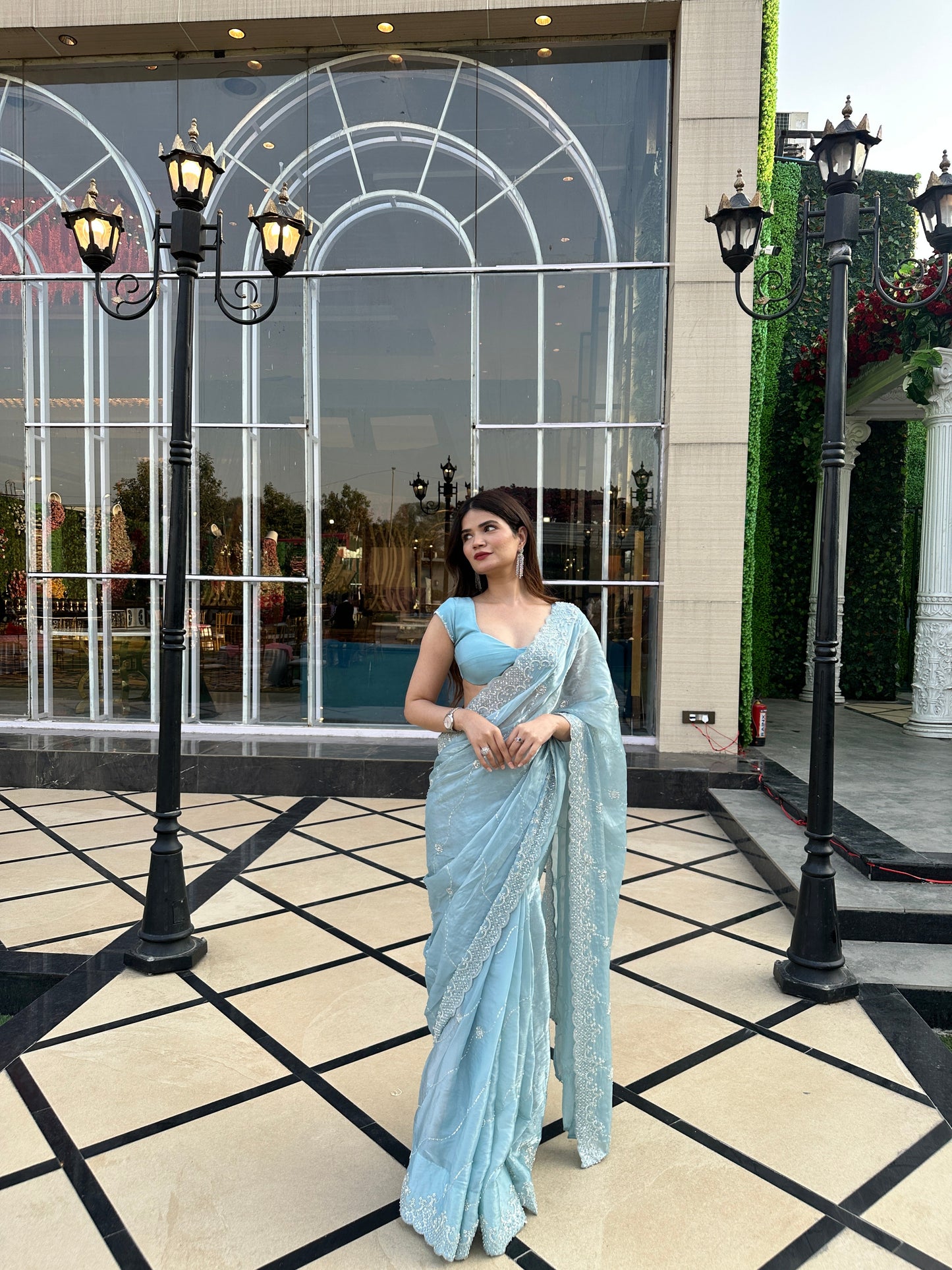 Blue Reva Saree by Imagine By Shiwali, featuring intricate traditional patterns and elegant drape in a vibrant blue color.