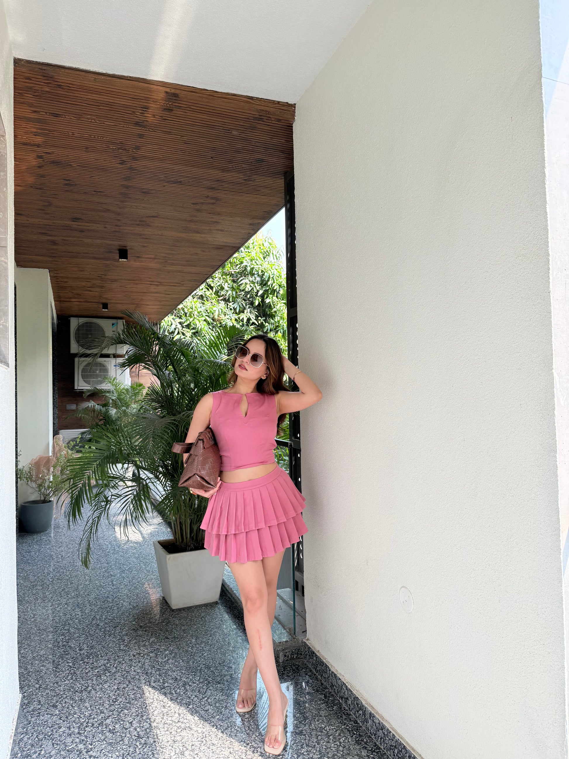 Imagine By Shiwali pink skirt and top set featuring a stylish, coordinated outfit with a flowing skirt and matching top.
