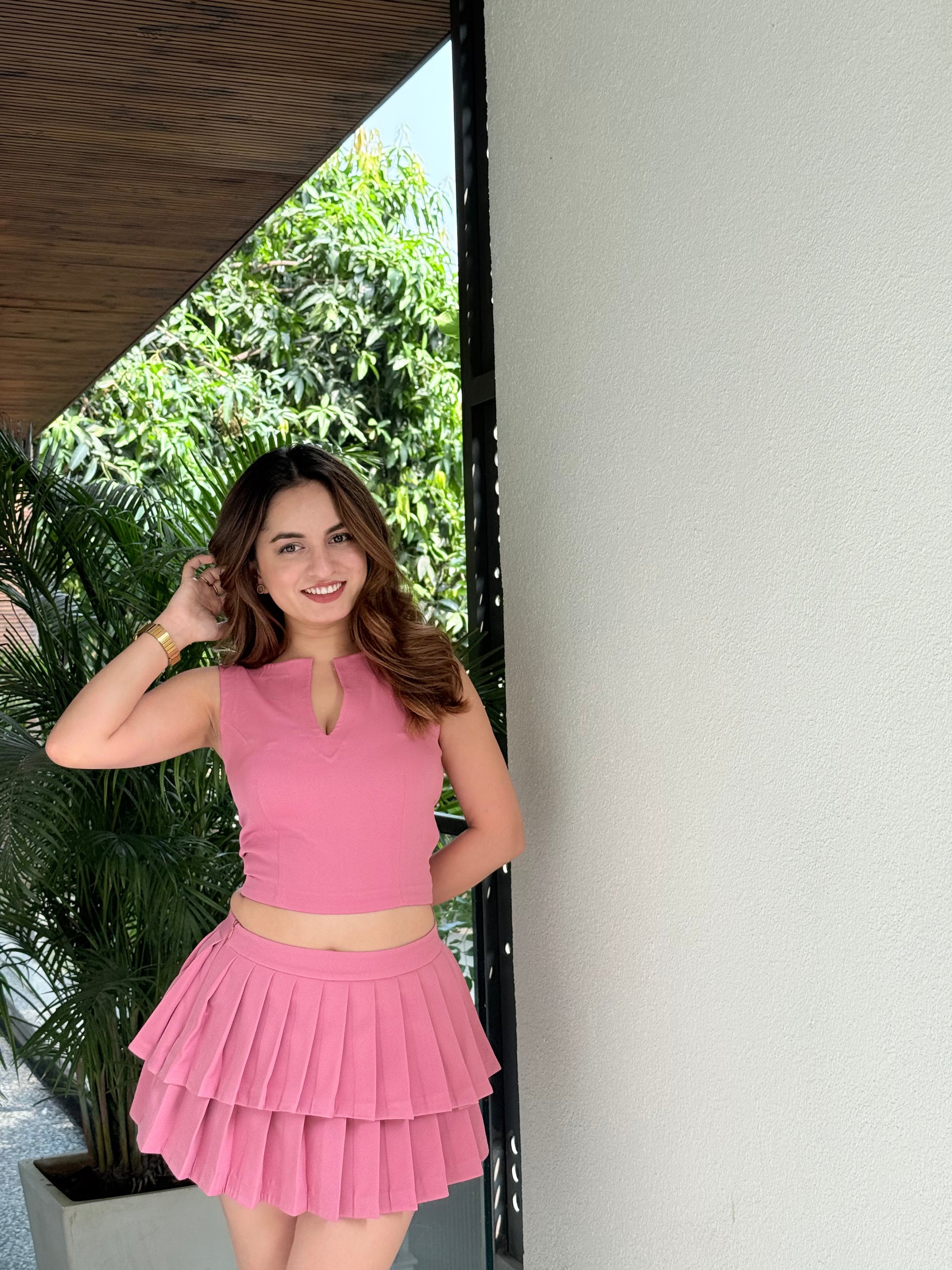 Imagine By Shiwali pink skirt and top set, featuring a stylish matching outfit with a flowy skirt and sleeveless top.