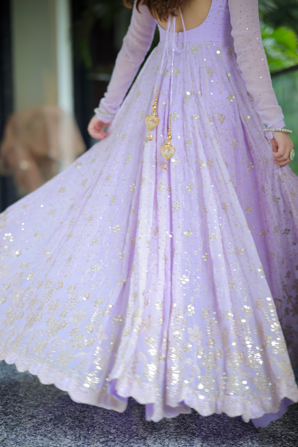 Imagine by Shiwali Sabya lilac anarkali with intricate embroidery and flowy fabric, displayed on a hanger.