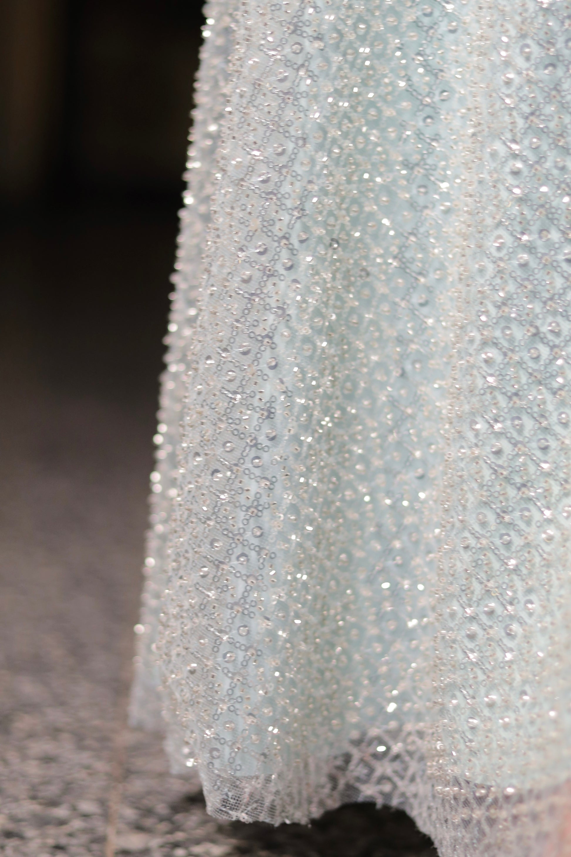 Ice blue Samantha gown by Imagine By Shiwali, featuring elegant fabric and intricate design, shown on a mannequin.