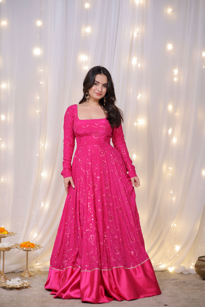 Fuchsia pink Sanvi lehenga with embroidered green dupatta and matching potli bag, designed by Imagine By Shiwali.