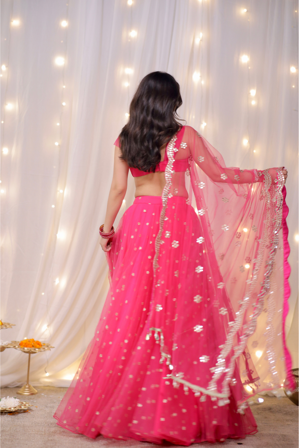 Hot pink embellished lehenga set by Imagine by Shiwali, featuring intricate embroidery and traditional design.