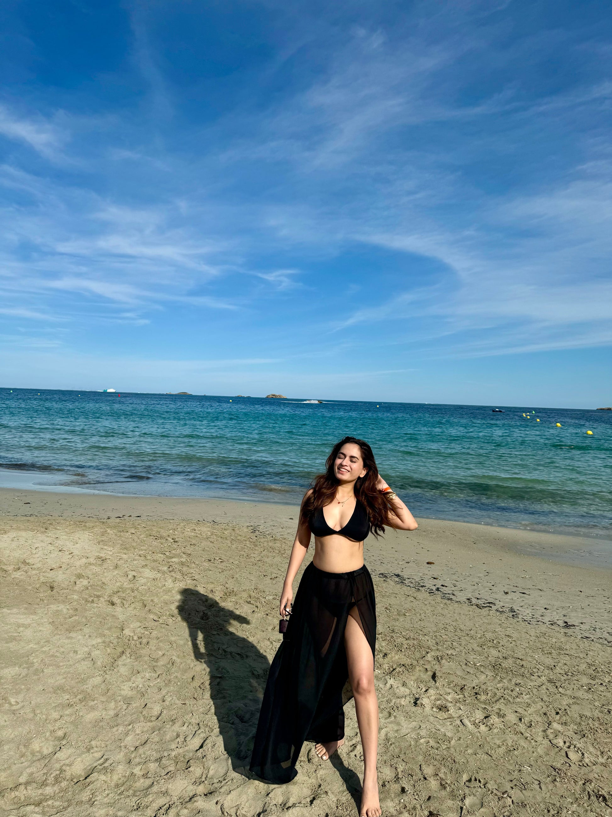 Scarlet Black bikini set by Imagine By Shiwali, featuring a triangle top and matching bikini bottoms.