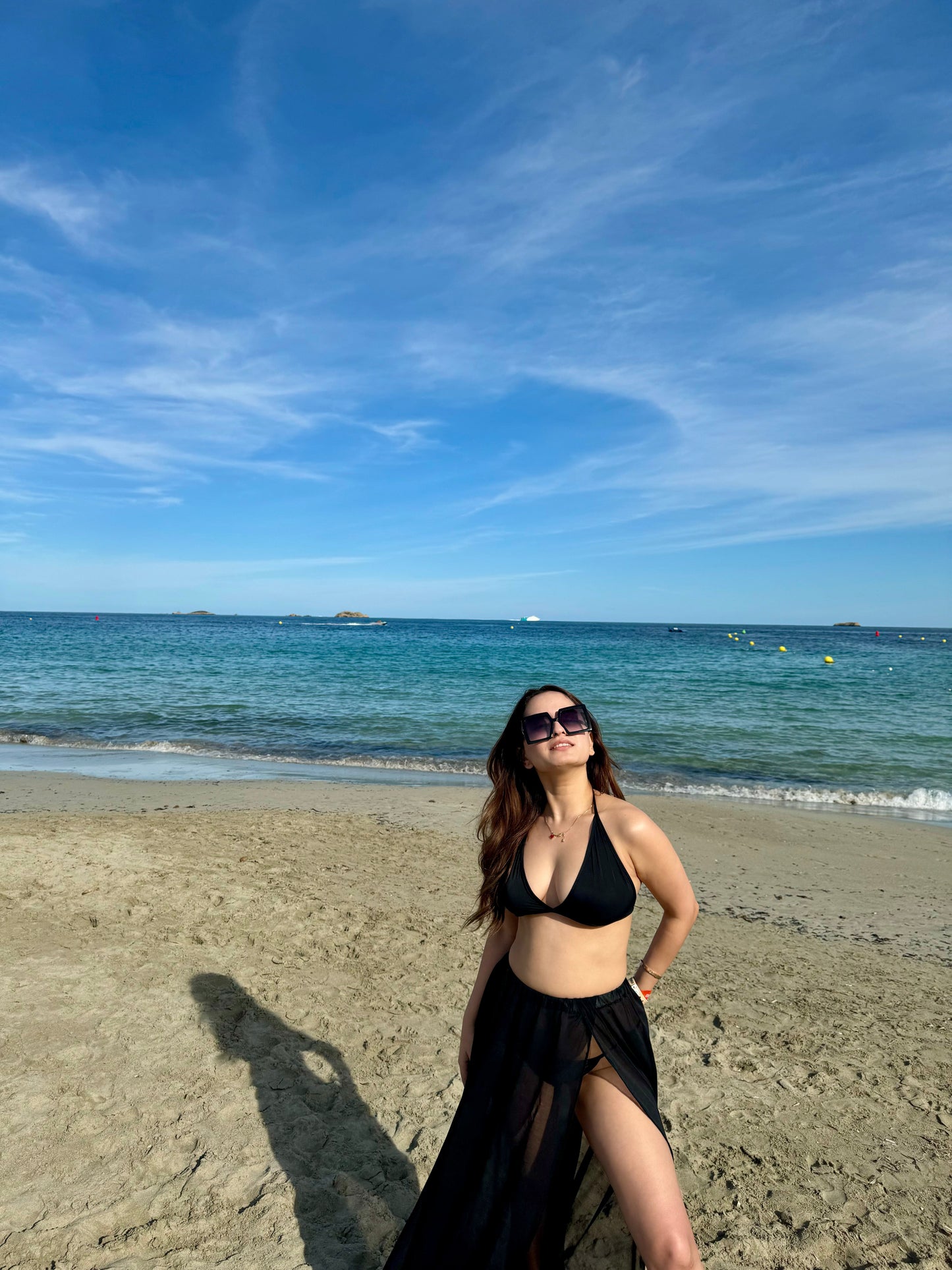 Scarlet black bikini set by Imagine By Shiwali featuring a triangle top and matching bottoms.