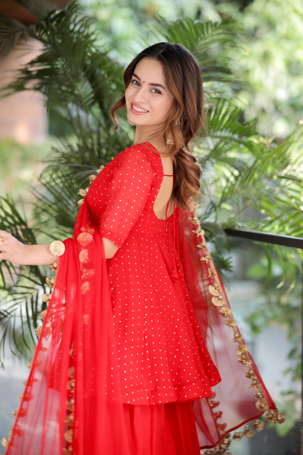 Red Suraiya peplum suit by Imagine By Shiwali, featuring a stylish peplum top and matching traditional bottom.