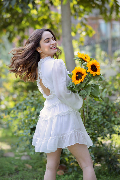 Imagine by Shiwali Vanessa White Frill Dress displayed on a model with ruffled sleeves and a flowy silhouette.