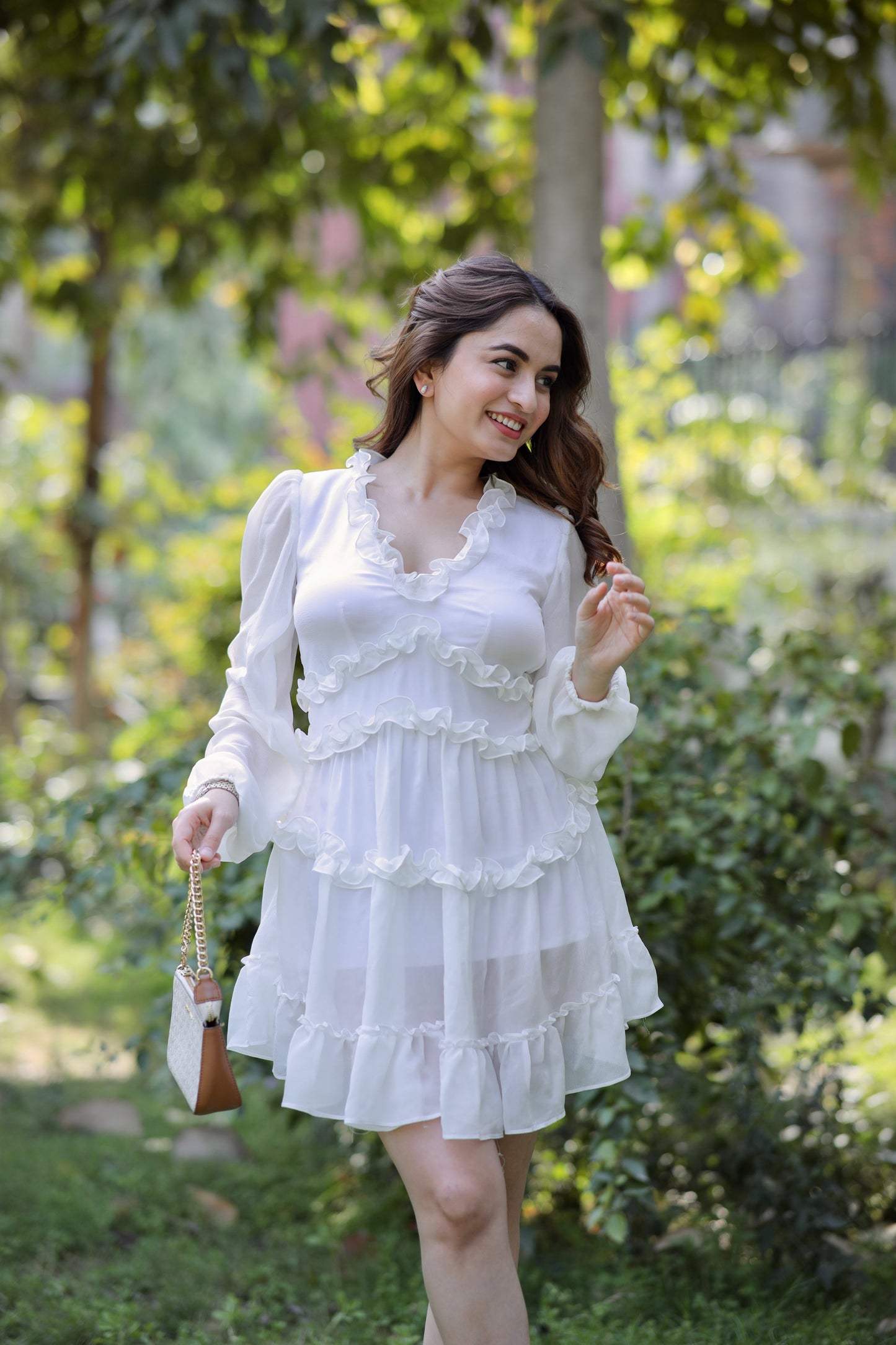 White Vanessa Frill Dress by Imagine By Shiwali, featuring ruffled details and a stylish, feminine design for special occasions.