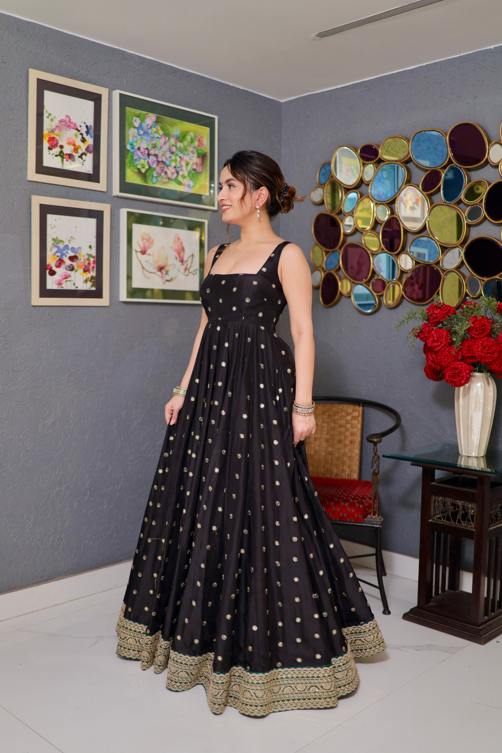 Imagine By Shiwali Zoya black Anarkali dress with intricate embroidery and flowing fabric, shown on a model.