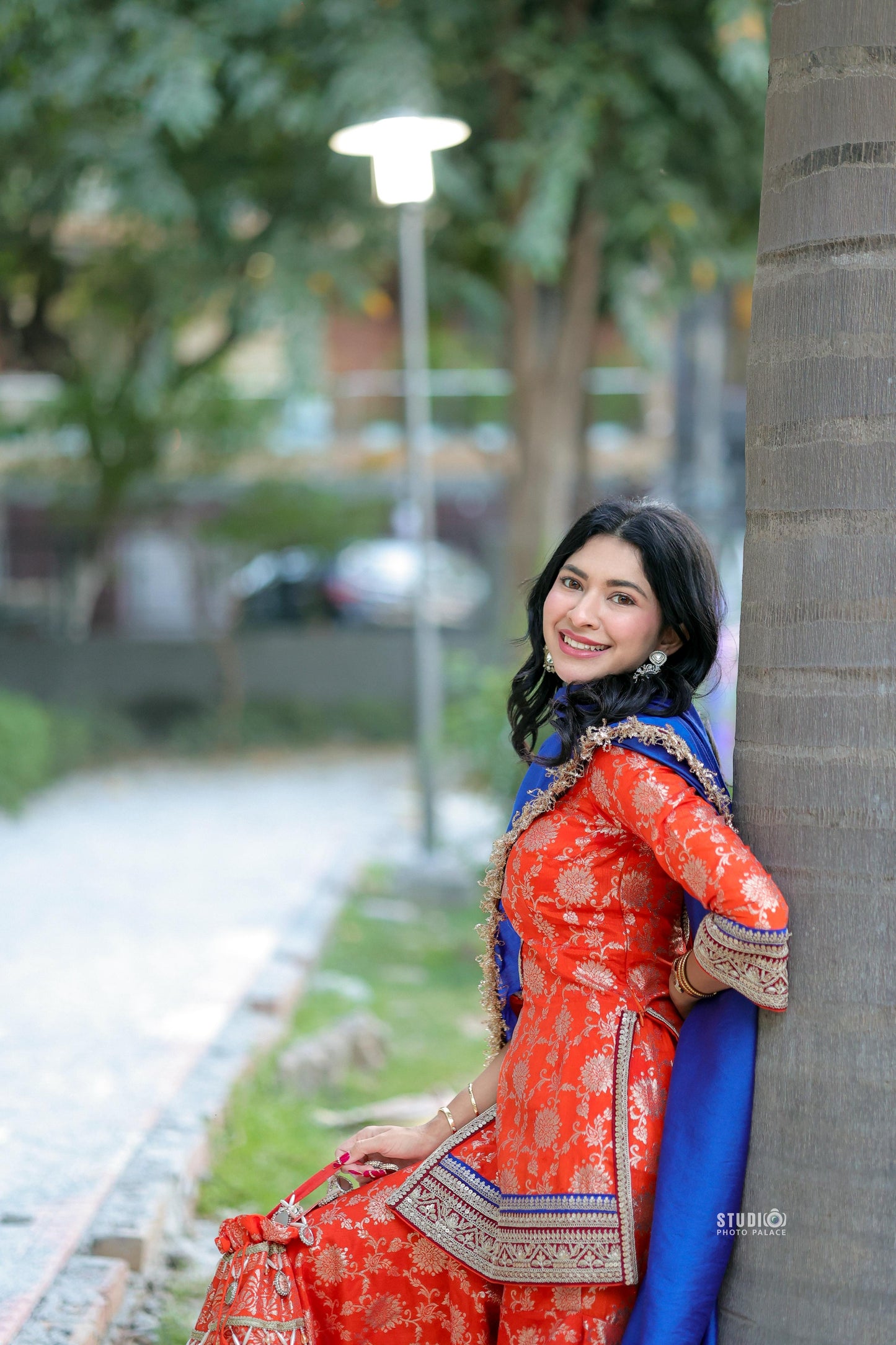 Orange and blue Abhilasha Sharara set by Imagine By Shiwali featuring intricate embroidery and traditional design.