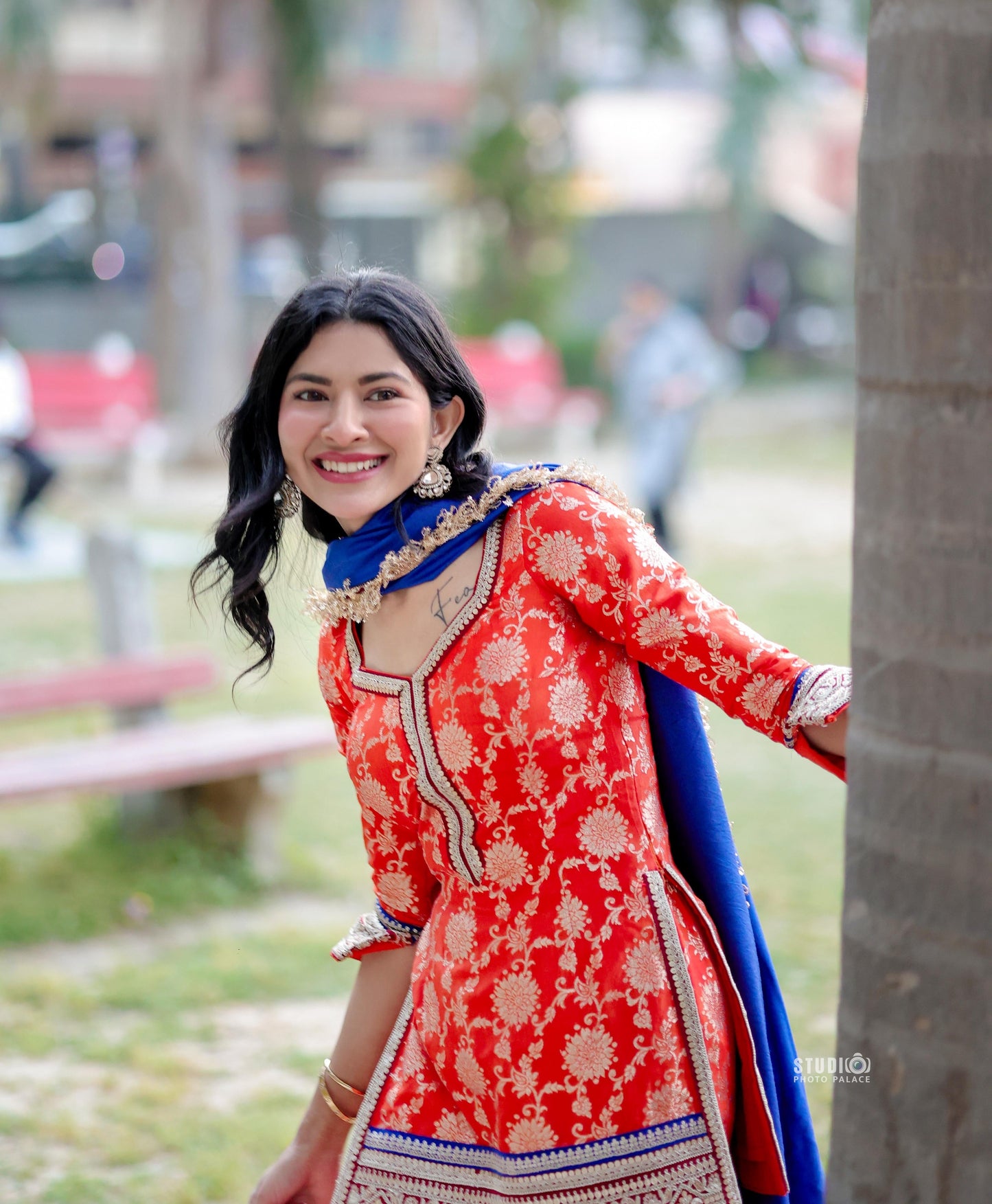 Orange and blue Abhilasha Sharara set by Imagine By Shiwali featuring traditional embroidery and flowing fabric.
