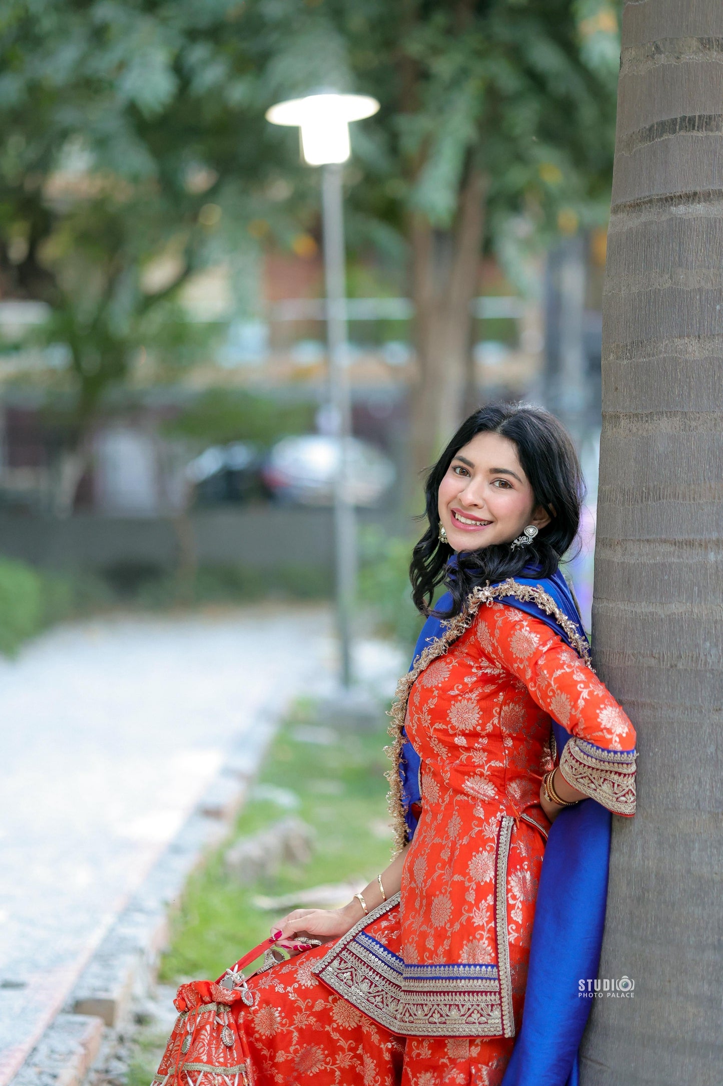 Orange and blue Abhilasha Sharara set by Imagine By Shiwali featuring intricate embroidery and traditional styling.