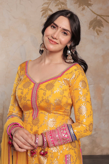 Yellow and pink Abhilasha sharara suit by Imagine By Shiwali featuring intricate embroidery and traditional styling.