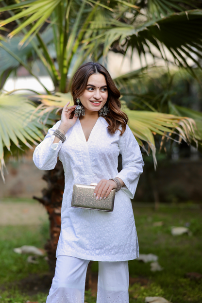 Aliza Chickankari short kurta and pants set by Imagine By Shiwali, featuring intricate embroidery and comfortable fabric.