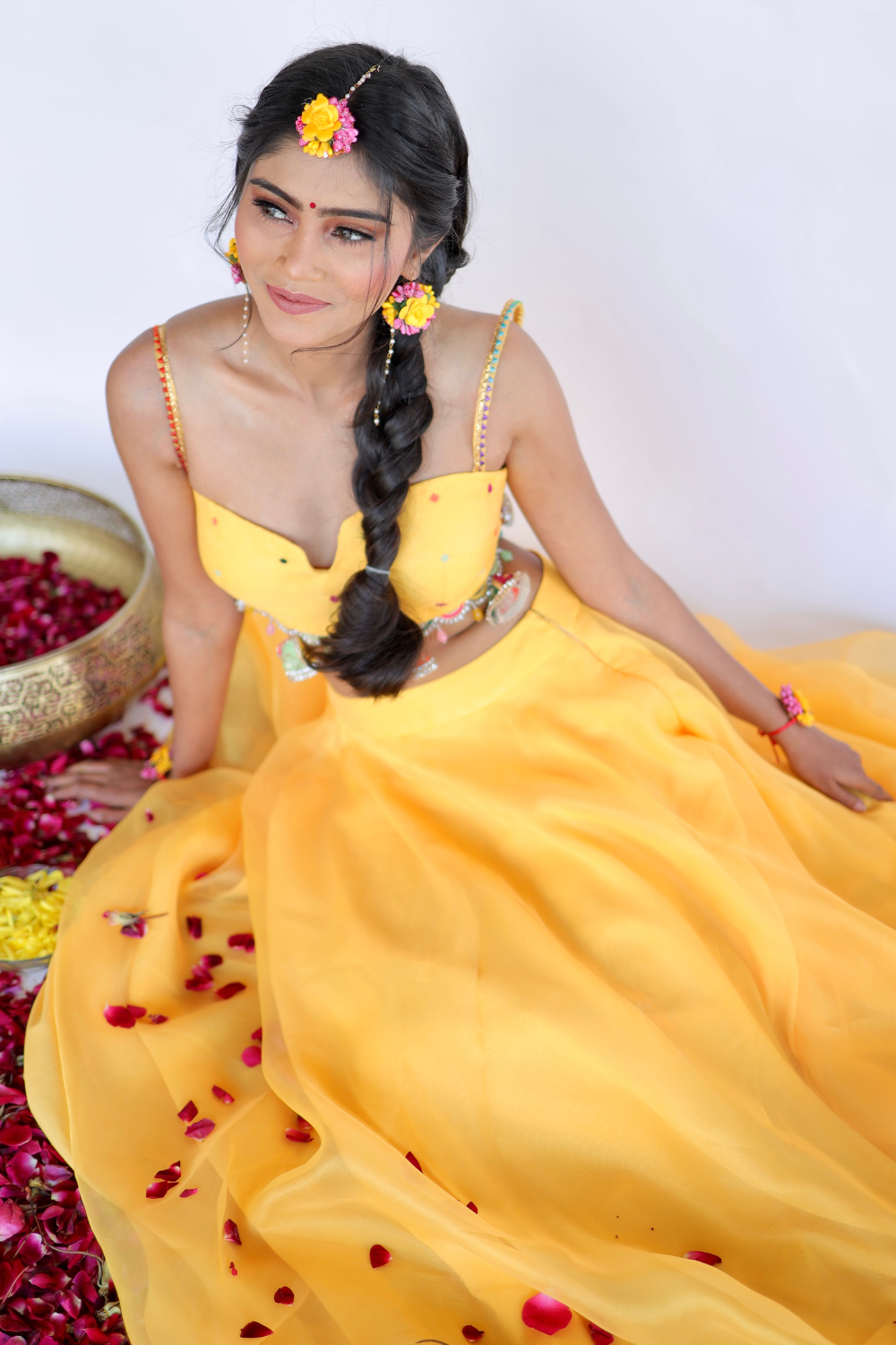Yellow Amara Lehnga by Imagine Shiwali featuring intricate embroidery and traditional design, displayed on a mannequin.
