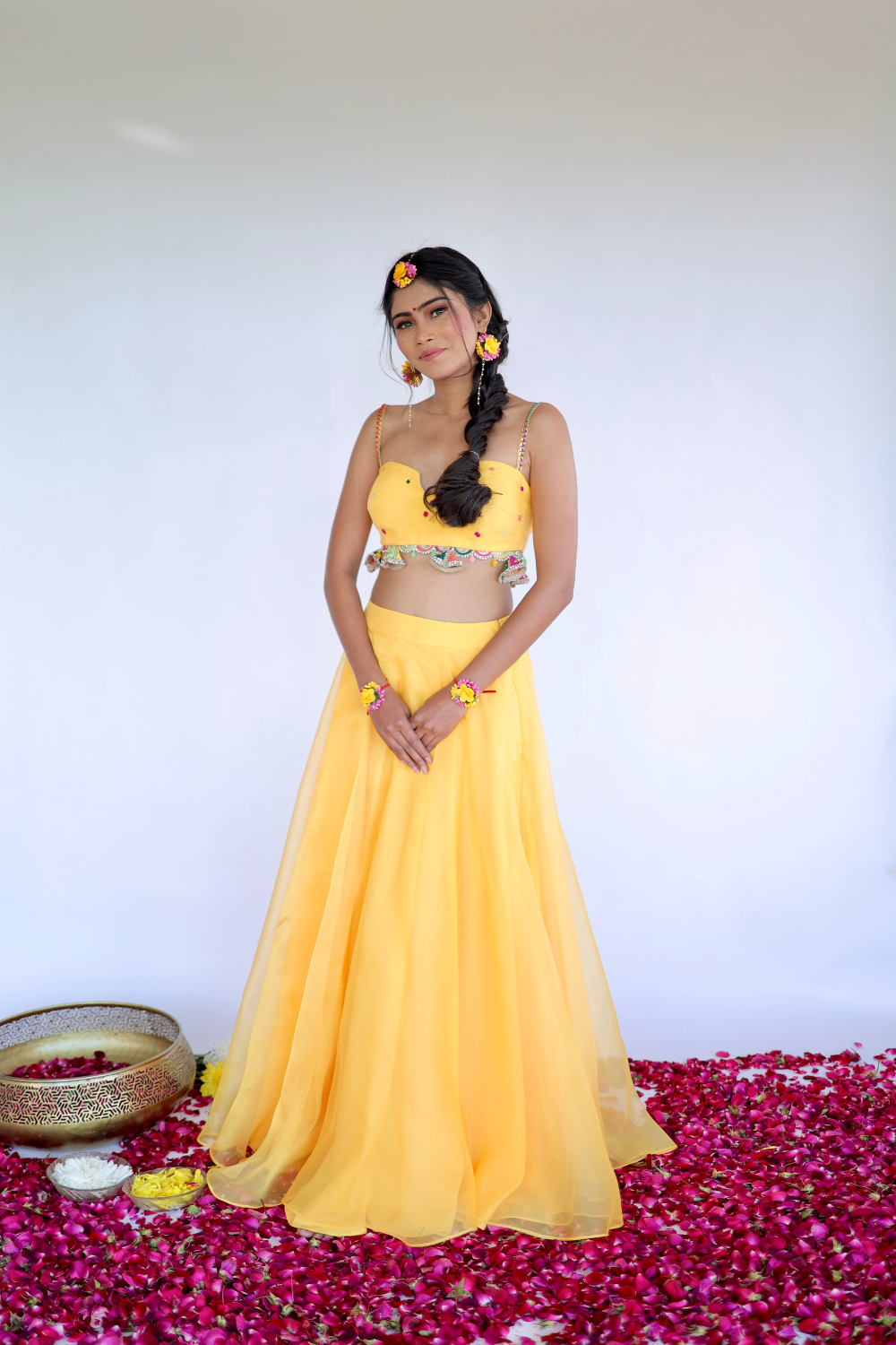 Imagine by Shiwali Amara Yellow Lehnga featuring intricate embroidery and flowing fabric, shown on a mannequin.