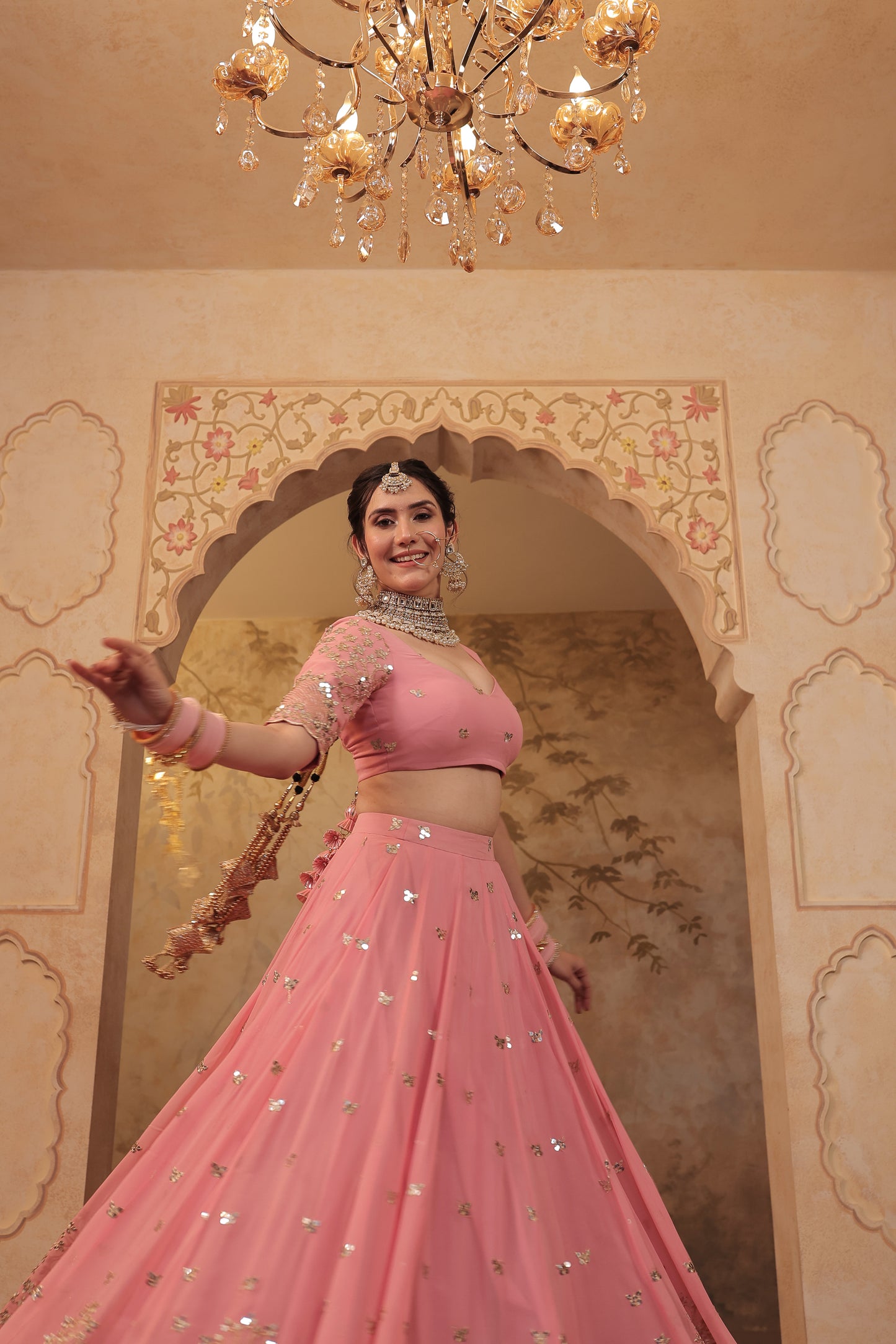 Soft pink bridal lehnga by Imagine By Shiwali featuring intricate embroidery and traditional design for special occasions.