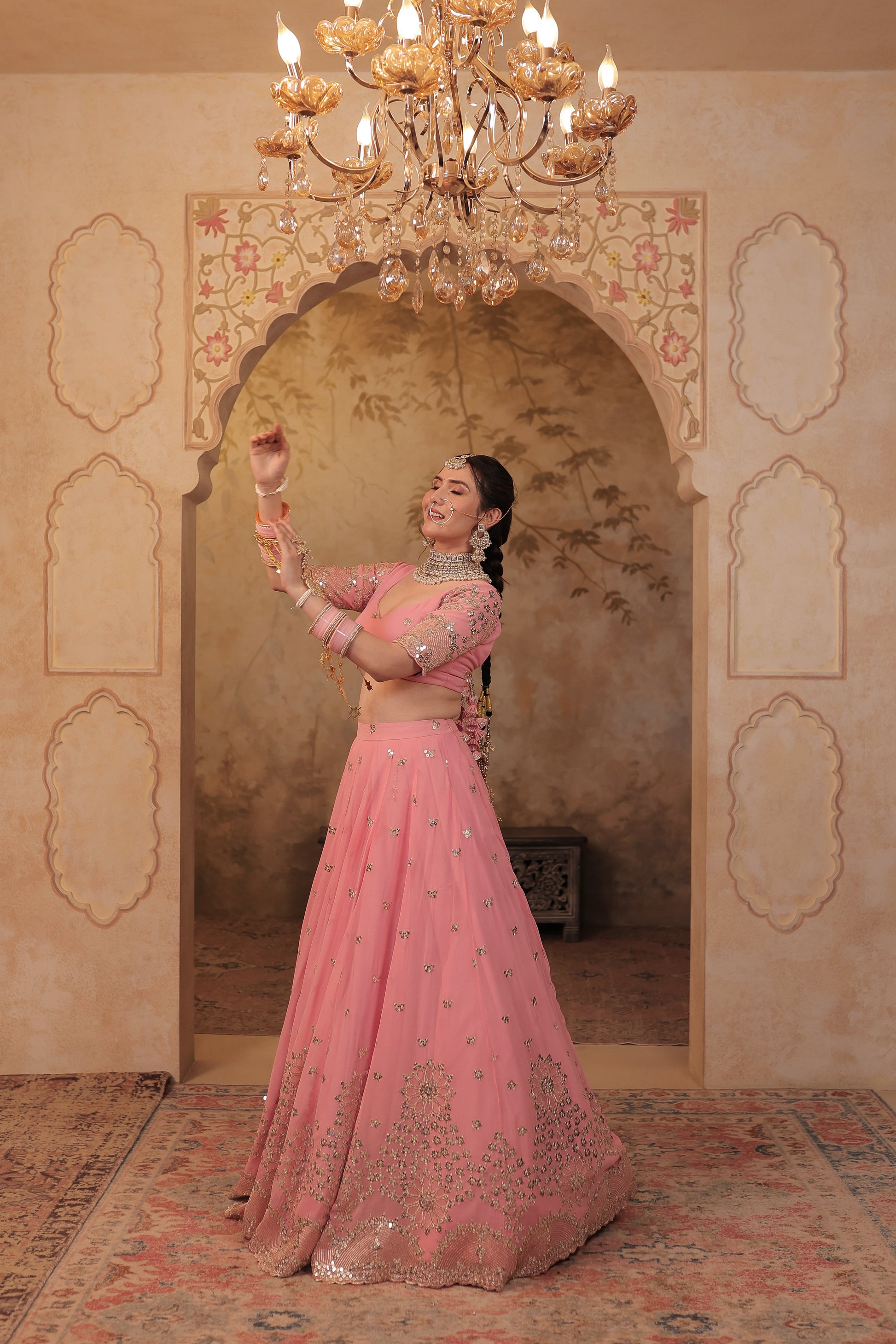 Soft pink bridal lehnga by Imagine by Shiwali featuring intricate embroidery and traditional design, perfect for wedding celebrations.